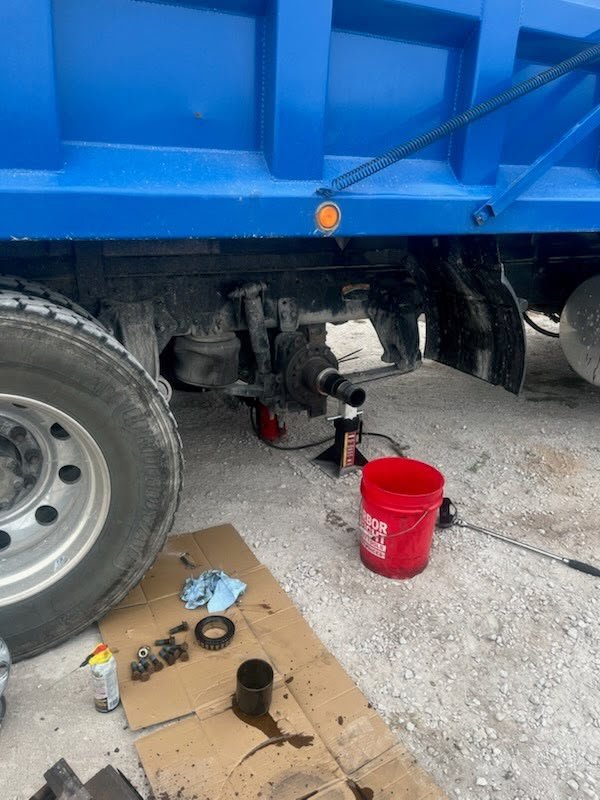 Dump truck wheel hub repair